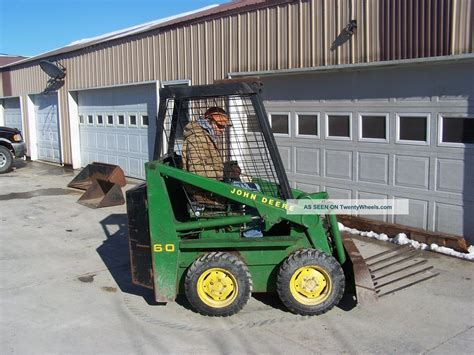 jonh deer skid steer 60 how high raidrer|John Deere 60 skid steer loader: Specifications and technical data.